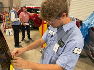 The Carolina's Collision Association shared this image on Facebook of a student competing in a SkillsUSA regional competition in April 2022.